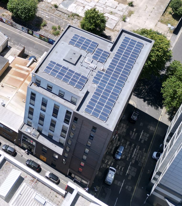 Aerial view of 22 Middle Street, Portsmouth, with solar panels across the roof.